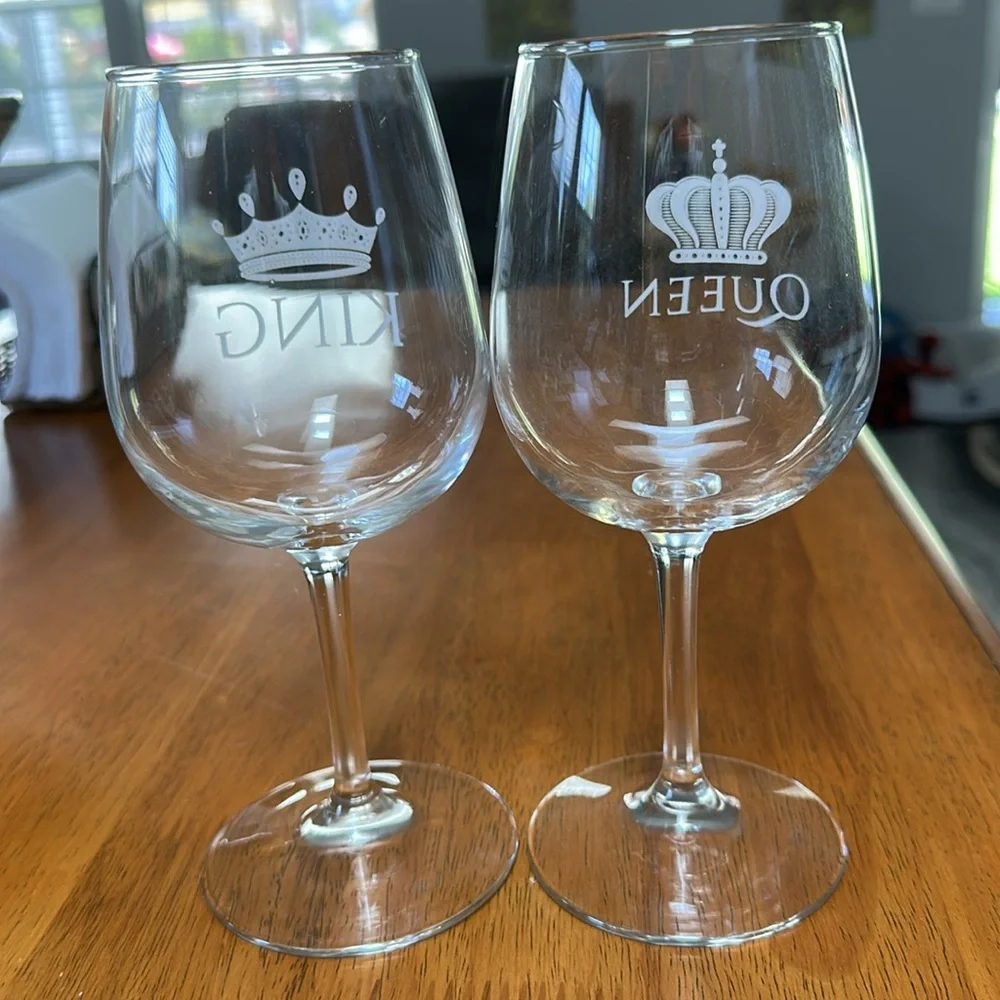 DuVino wine glasses. “King” & “Queen” along with crowns. Clear, white writing